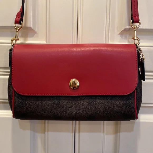 This is a like new coach cross body bag. - Picture 5 of 9